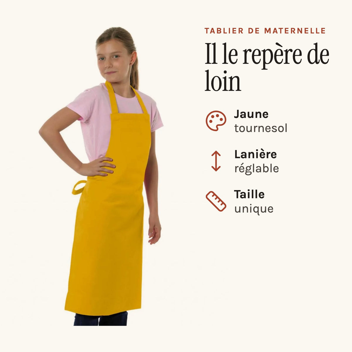 Tablier jaune pour la maternelle, jaune, porté par une enfant