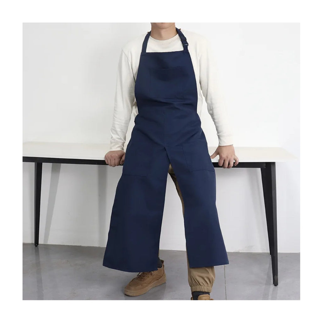 Tablier potier fendu en toile, à deux pans, bleu marine, porté