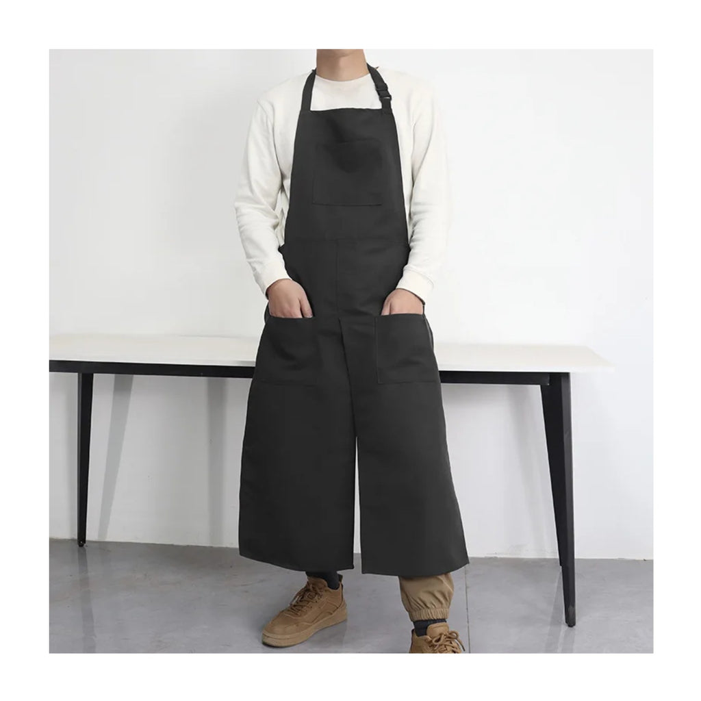 Tablier potier fendu en toile, à deux pans, noir, porté