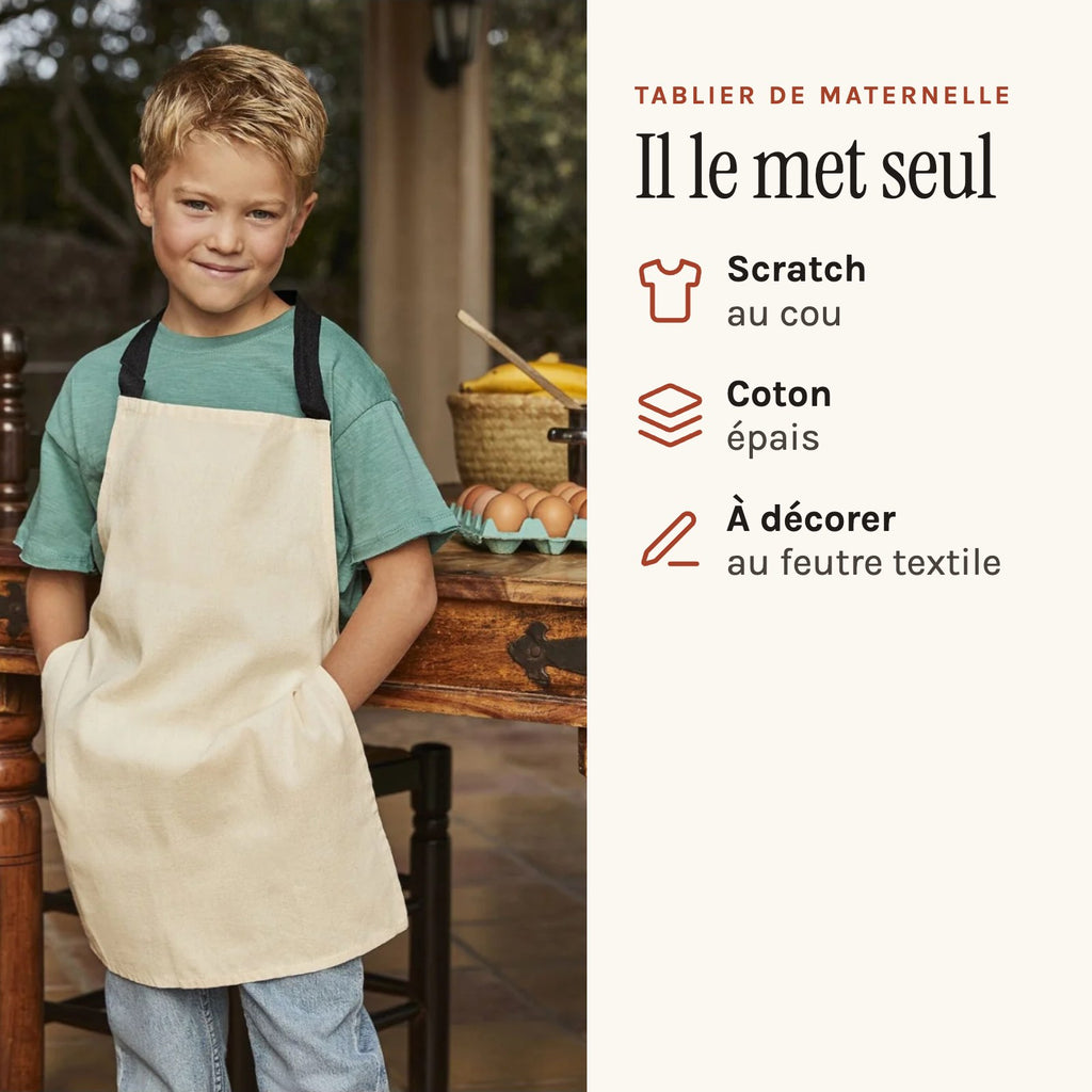 Tablier en tissu pour la maternelle, naturel, porté par un enfant